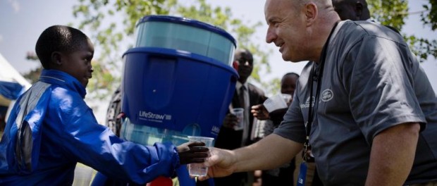 Nigel Clarke from JLR talks to a young boy