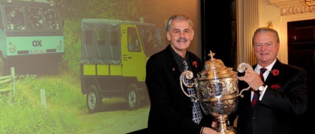 Gordon Murray receives the Dewar Trophy from RAC Chairman Tom Puves