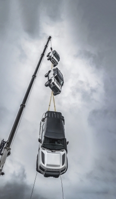 Land Rover Defender is Top Gear's Car of the Year - Defender Dangling from a Crane