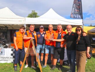 Classic Rover Parts team receives the Best Stand Award trophy at Beaulieu International Autojumble 2026