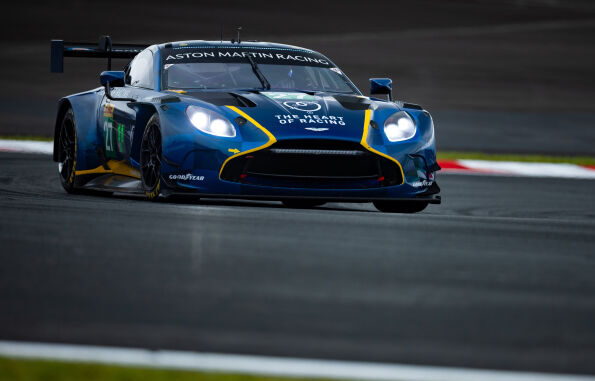 The Heart of Racing Team's blue and yellow No. 27 Aston Martin Vantage GT3 on track at Fuji Speedway.