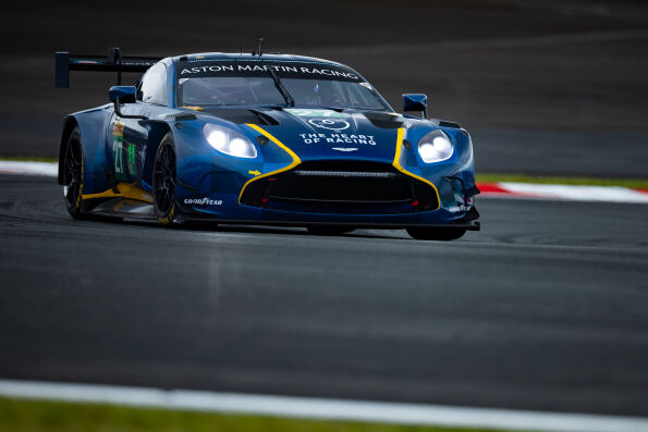 The Heart of Racing Team's blue and yellow No. 27 Aston Martin Vantage GT3 on track at Fuji Speedway.