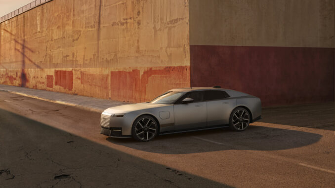 Jaguar Type 01 electric four-door GT, front three-quarter view in silver