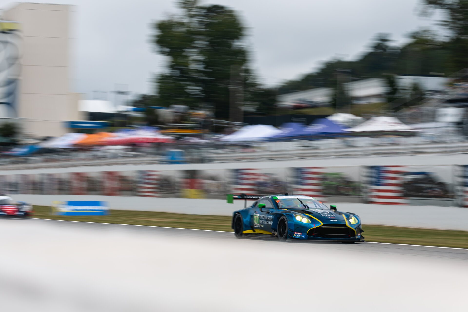 The Heart of Racing number 27 Aston Martin Vantage GT3 at speed at Michelin Raceway Road Atlanta