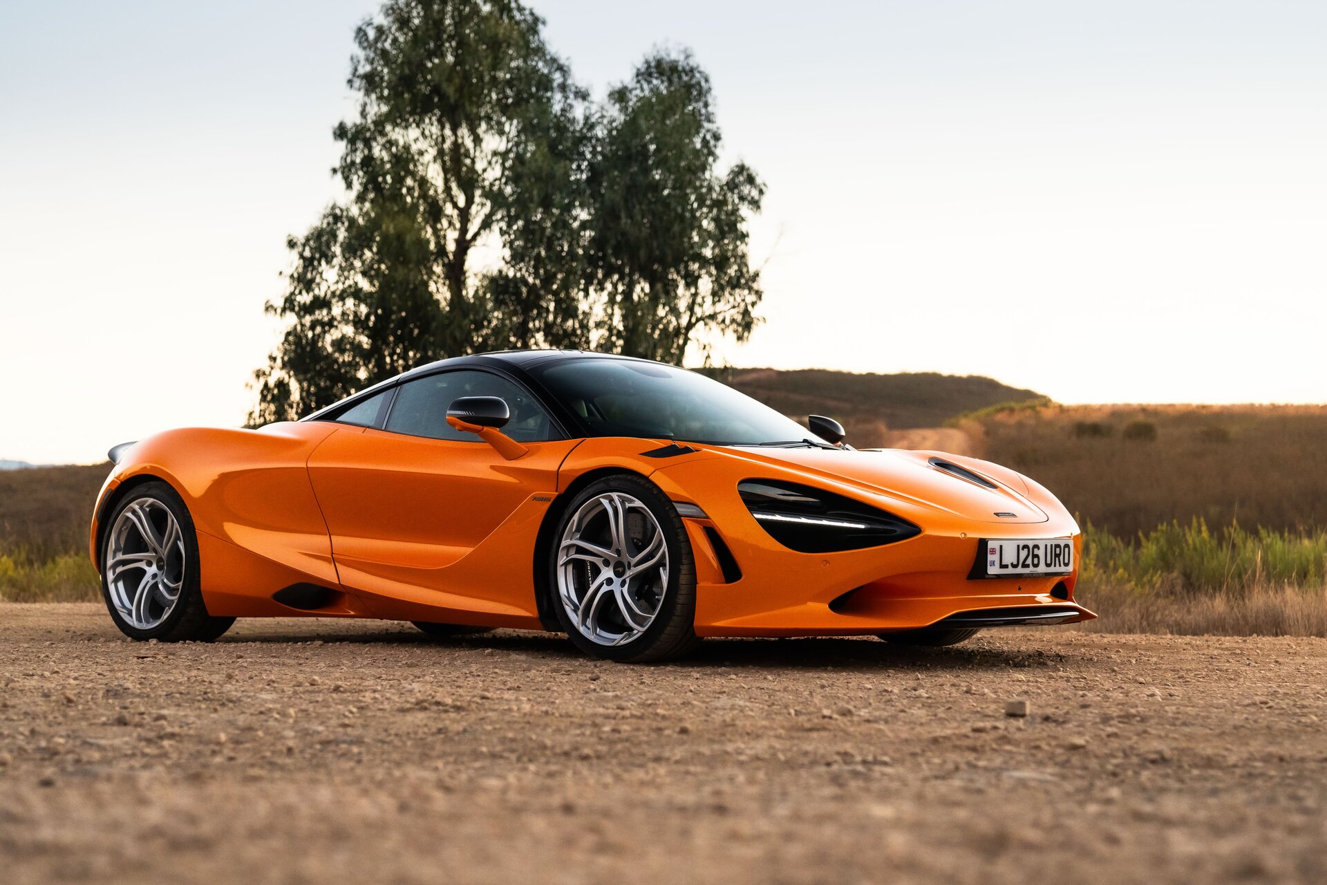 McLaren 750S front three-quarter view on a rural track