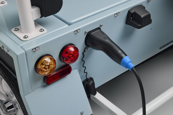 Charging cable plugged into the relocated rear charging port of the Electric MOKE Mk2