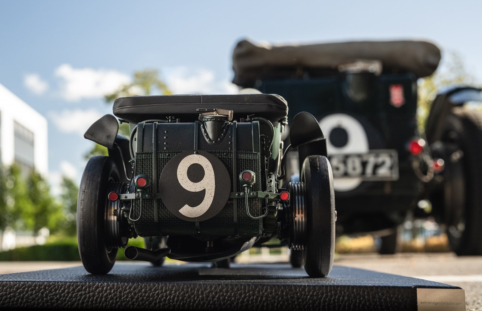 Rear view of Amalgam Collection's race-weathered 1:8 scale Bentley Blower model with hand-painted dirt and battle scars