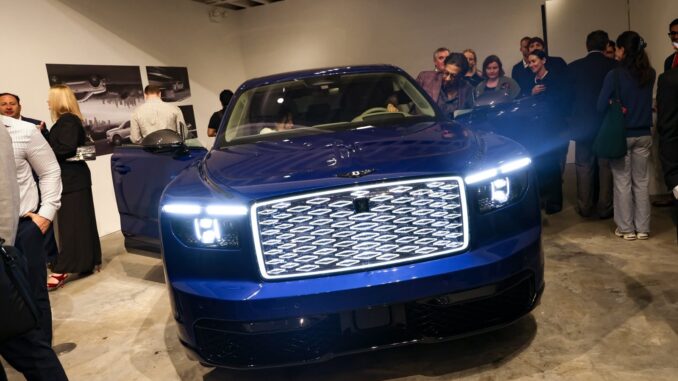 The all-new Bentley Torcal S First Edition in Sequin Blue with its illuminated diamond grille at CART Department in New York