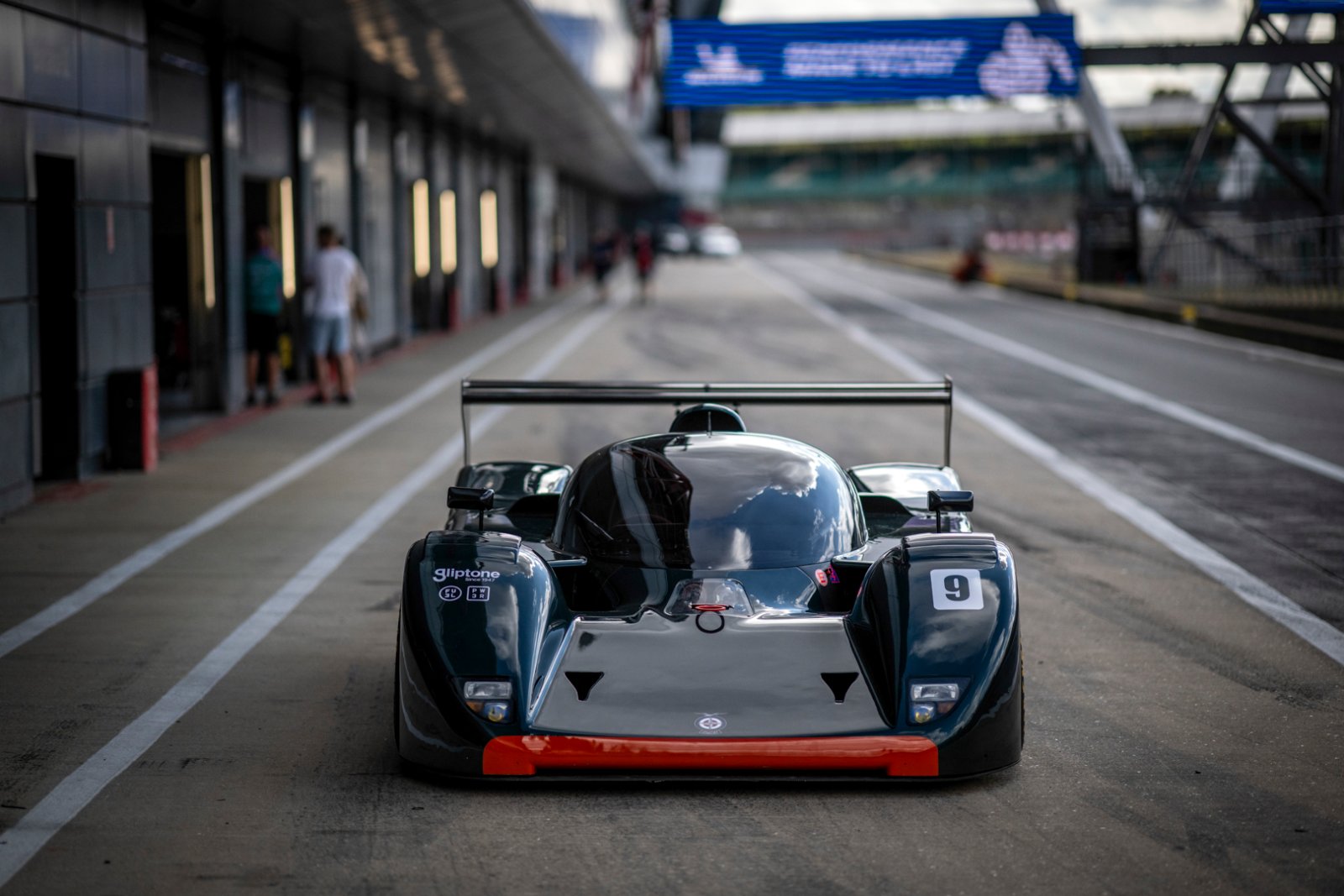 Head-on view of the restored BRM P351 in the Silverstone pit lane