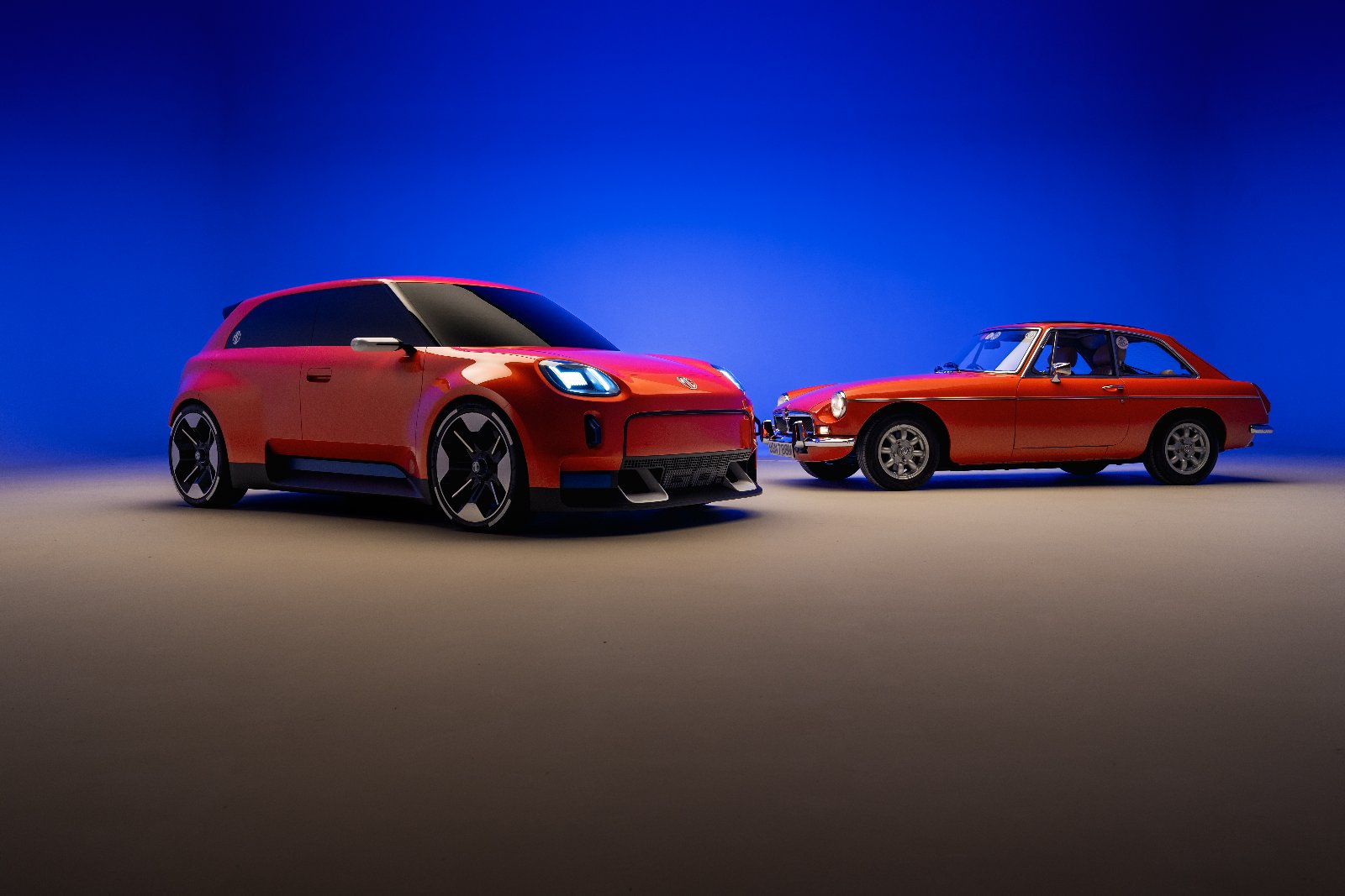 MG GO! electric concept car parked alongside the classic MGB GT that inspired it