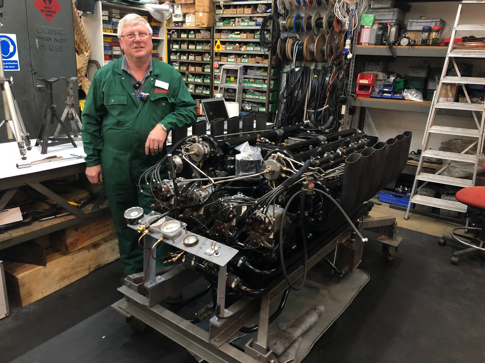 Senior Engineer Ian Stanfield with the restored Sunbeam 1000hp engine in the National Motor Museum workshop
