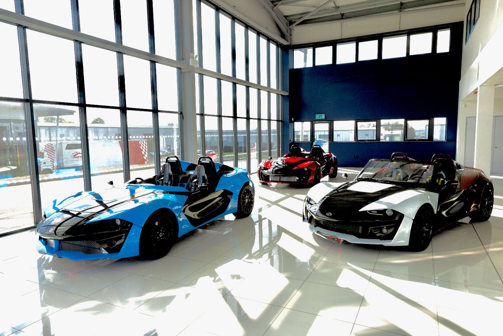 Three examples of the 2027 Zenos E10 range on display